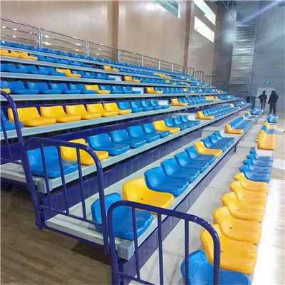 Electric retractable grandstand seating structure